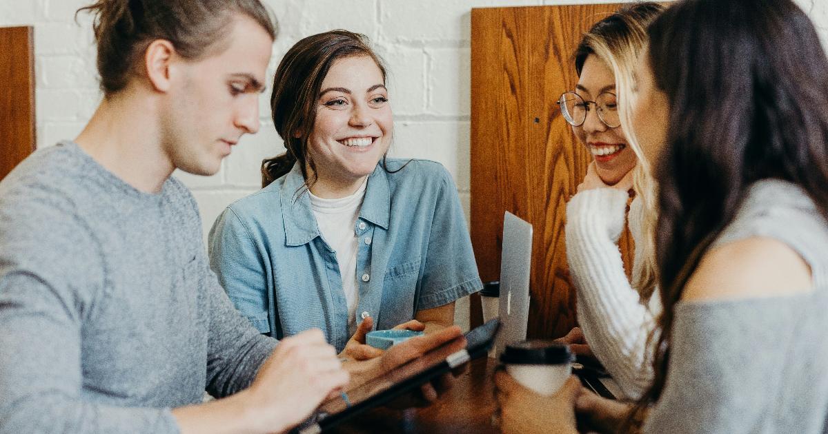 A product team reviews customer feedback, remembering that the focus keyword is about interpreting reactions, not assuming conclusions