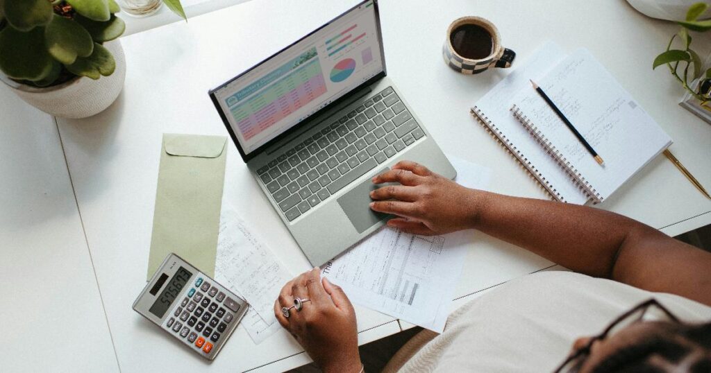 A small business owner reviewing costs and financing options, illustrating how to test SME demand for government support with real behavior.