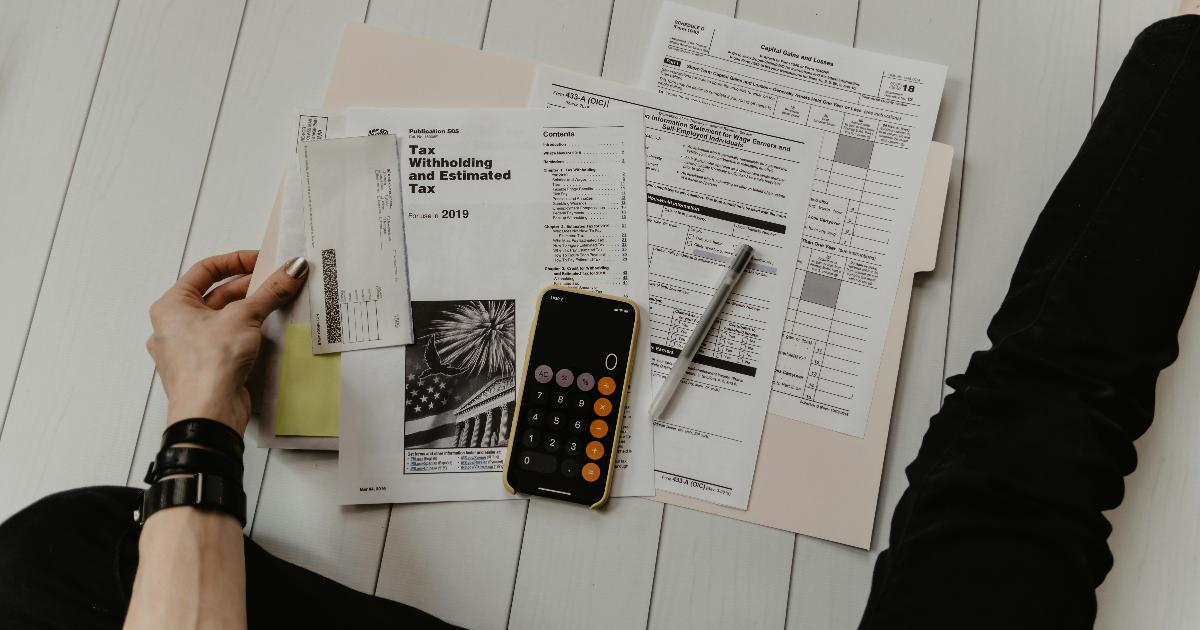 Startup founder reviewing UK corporation tax thresholds and cash flow planning for a business test