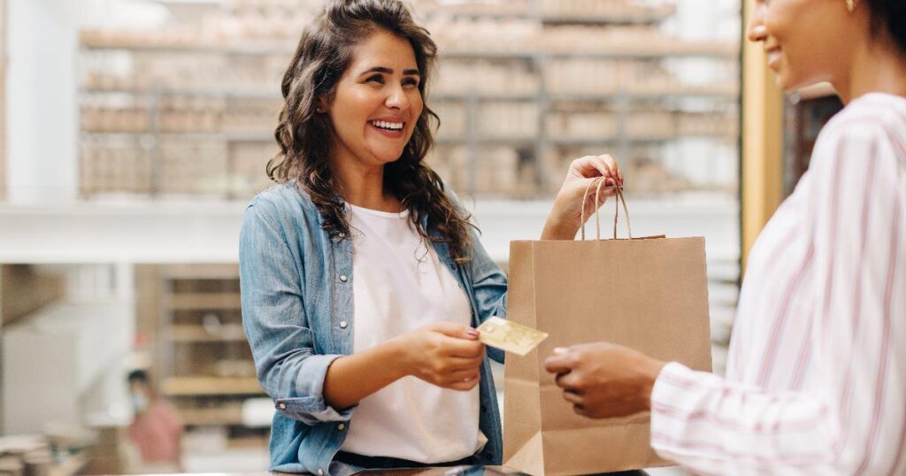A store launch learning loop with shoppers entering a small retail shop and staff observing customer behavior